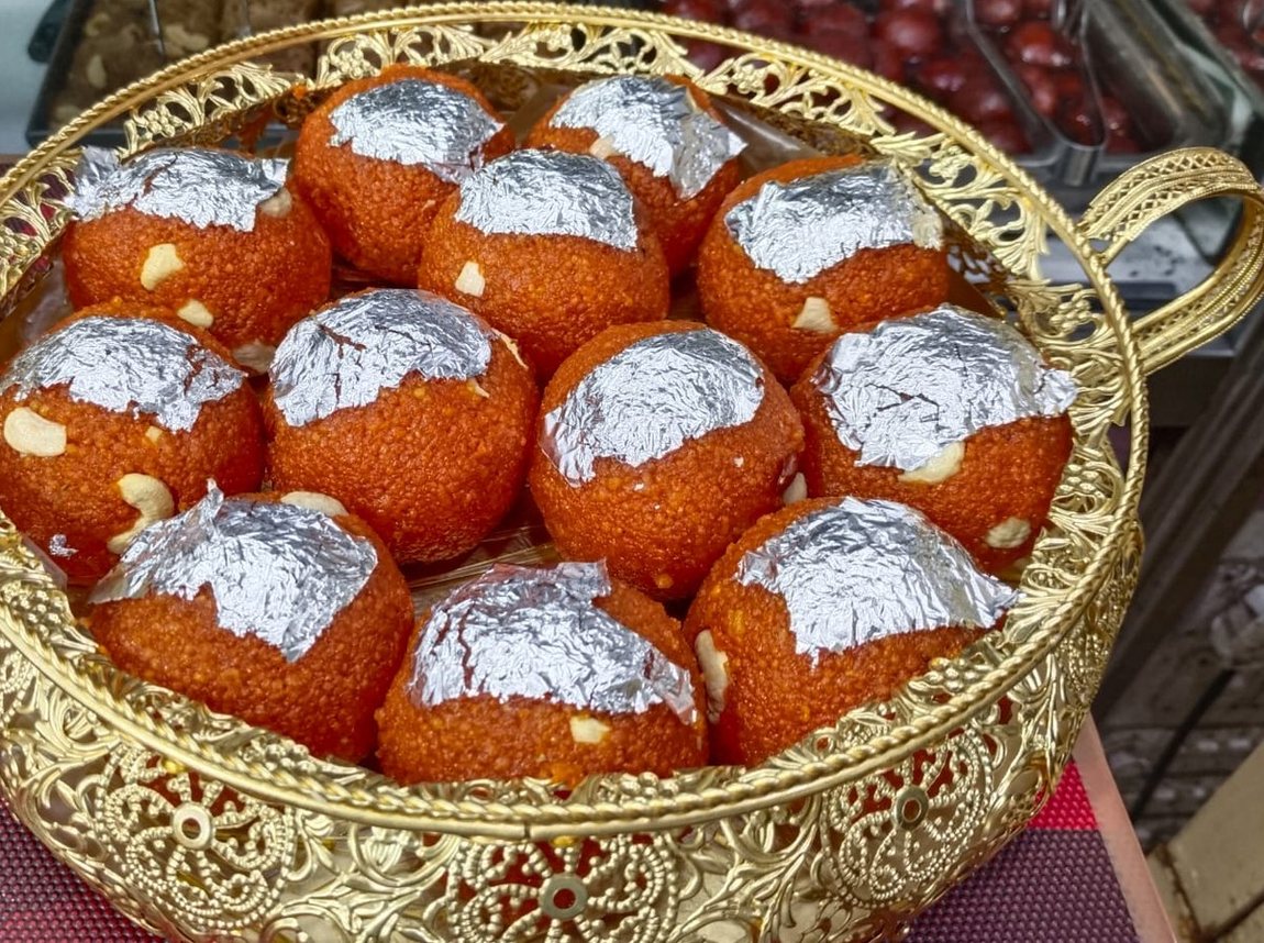 Silver-varak motichoor laddu in a gold bowl